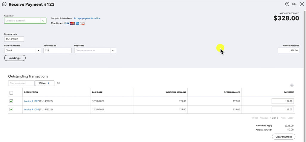 Receive payment screen with two paid invoices on one payment in QuickBooks Online.